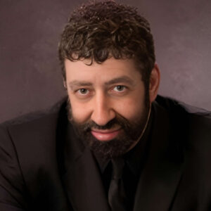 Jonathan Cahn<span> was named along with Billy Graham as one of the top spiritual leaders of the last 40 years to have radically impacted our world. He has spoken at the United Nations, at Capitol Hill, and to millions worldwide. Every book he's written, from "The Harbinger" to "The Josiah Manifesto," has landed on the New York Times Bestseller list. He has been called the prophetic voice of his generation. He leads Beth Israel at the Jerusalem Center in Wayne, New Jersey, and Hope of the World ministry, a global outreach of God's Word and compassion to the most needy.</span>